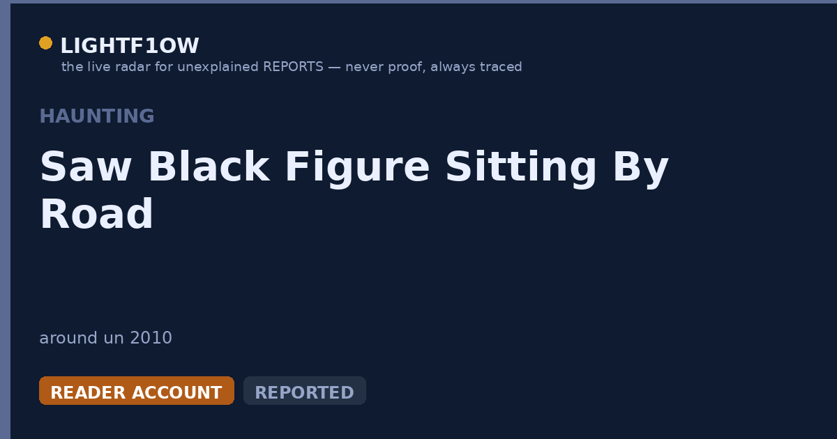 Saw Black Figure Sitting By Road