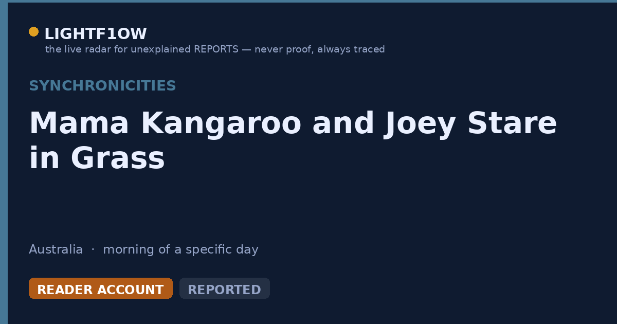 Mama Kangaroo and Joey Stare in Grass